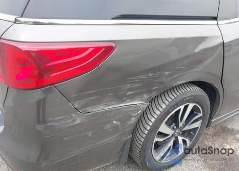 2018 Honda Odyssey Elite z USA, uszkodzony, nr VIN 5FNRL6H97JB025422